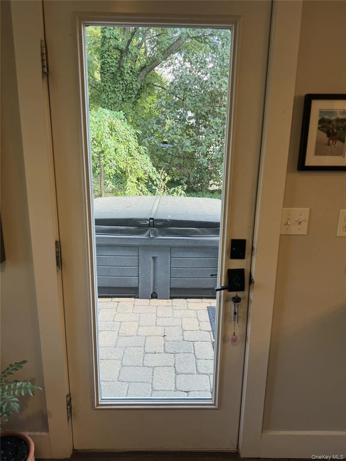 Doorway to outside with baseboards Doorway to outside with baseboards