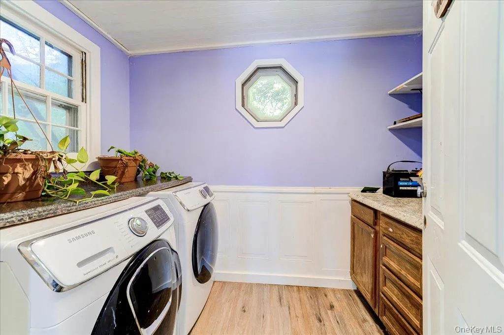 Main level laundry/utility room. Main level laundry/utility room.