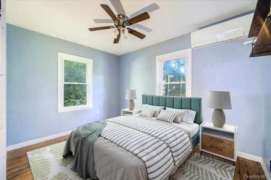 Bedroom #2 on the main level (Virtually Staged). Bedroom #2 on the main level (Virtually Staged).