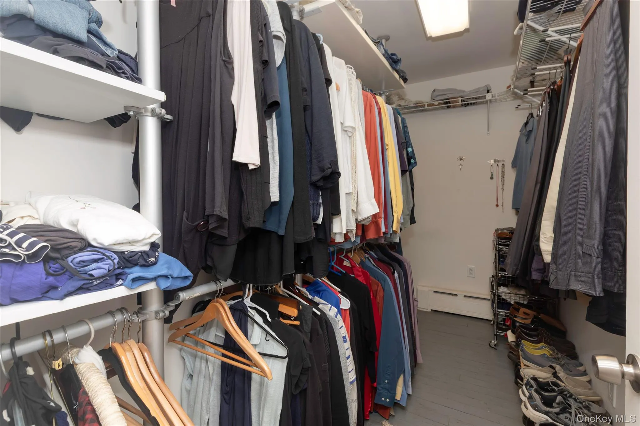 Primary bedroom closet. Primary bedroom closet.
