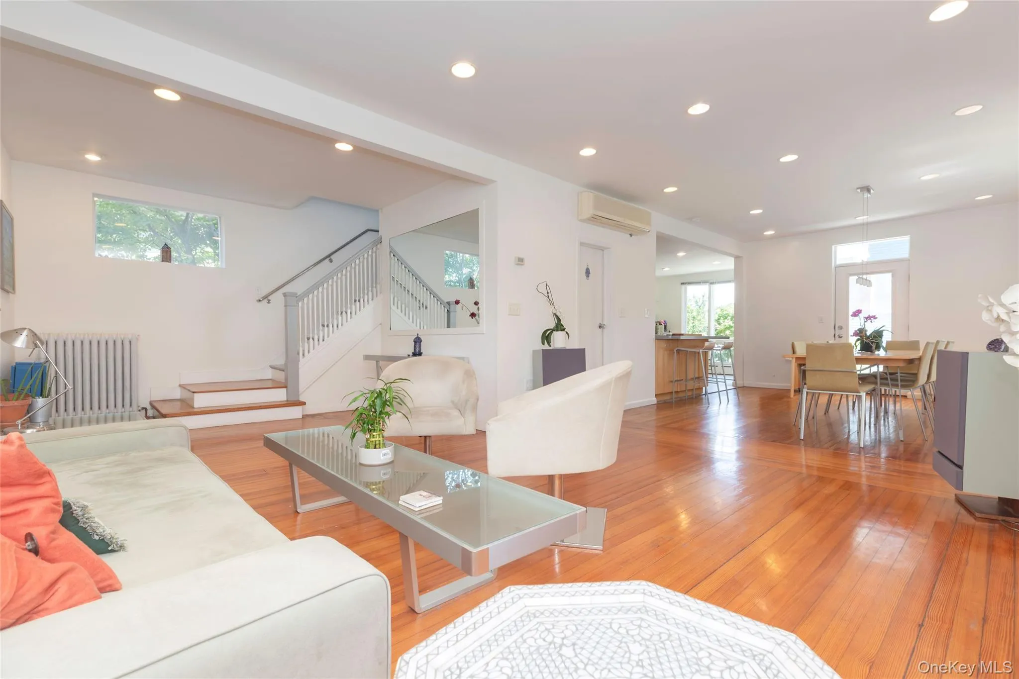 Open floor plan to dining room and kitchen. Open floor plan to dining room and kitchen.