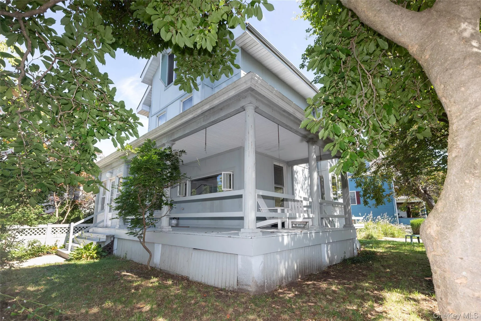 Front of home with view of partial wrap around porch. Front of home with view of partial wrap around porch.