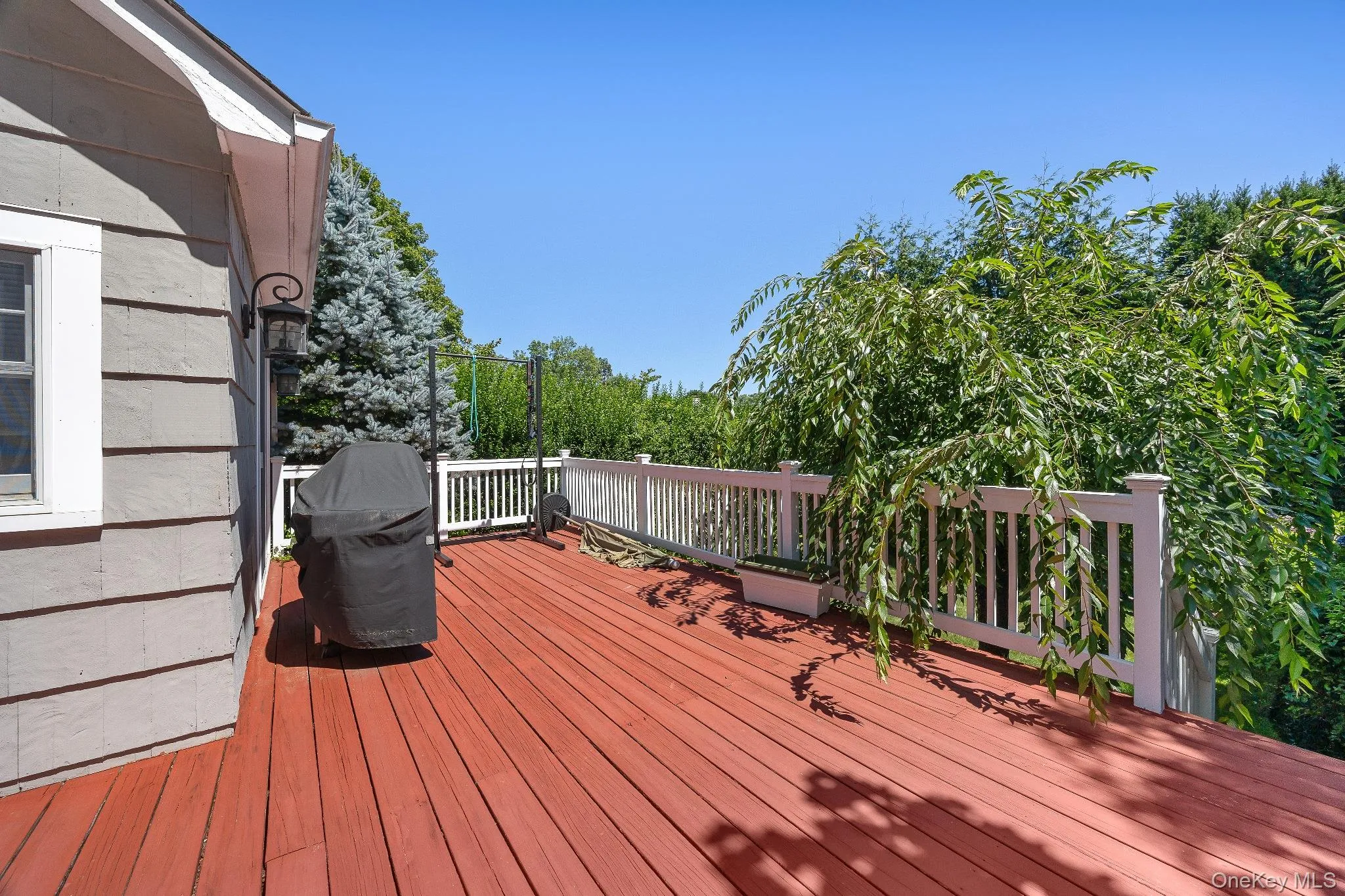 Deck featuring grilling area Deck featuring grilling area