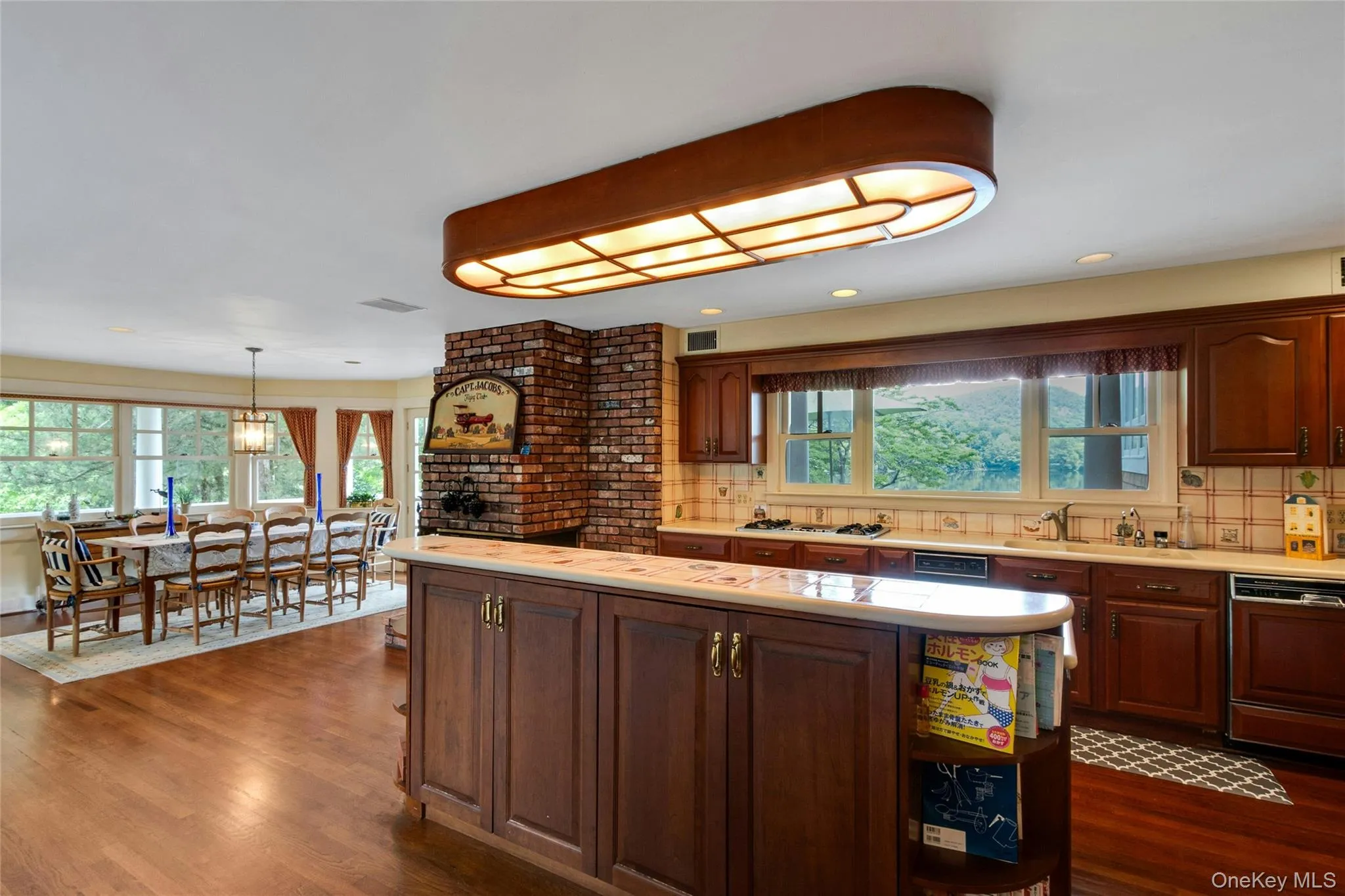 Kitchen - long view with dining table Kitchen - long view with dining table