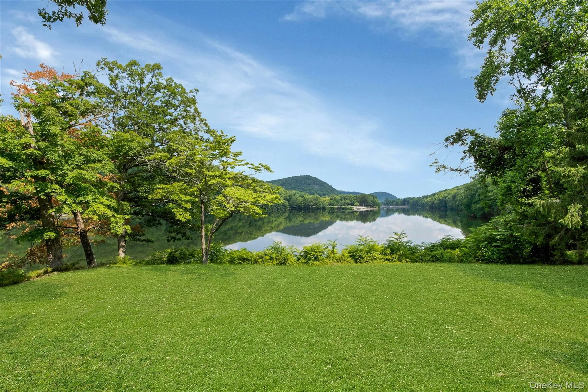Lawn view of Wee Wah lake and Ramapo mountains Lawn view of Wee Wah lake and Ramapo mountains