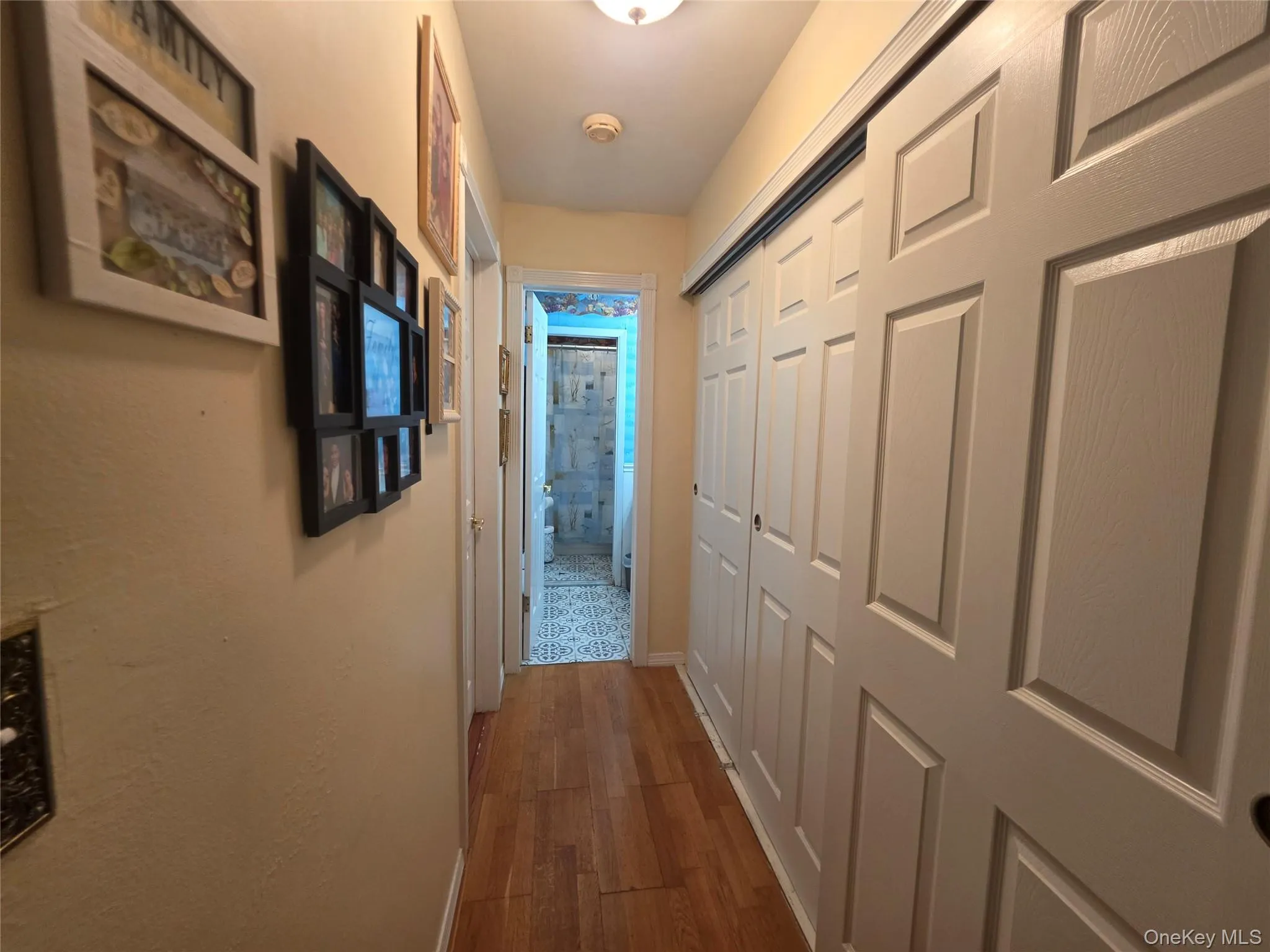 Entrance from living room to bedroom and bathroom area Entrance from living room to bedroom and bathroom area