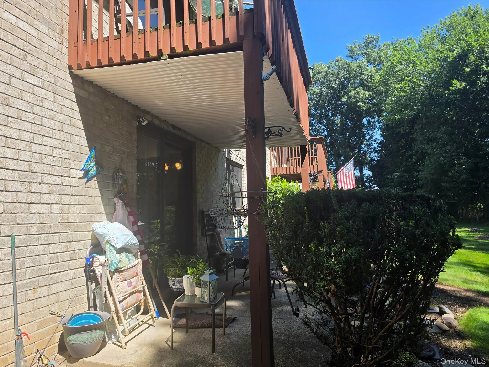 Patio with entrance from sliding doors from living room Patio with entrance from sliding doors from living room