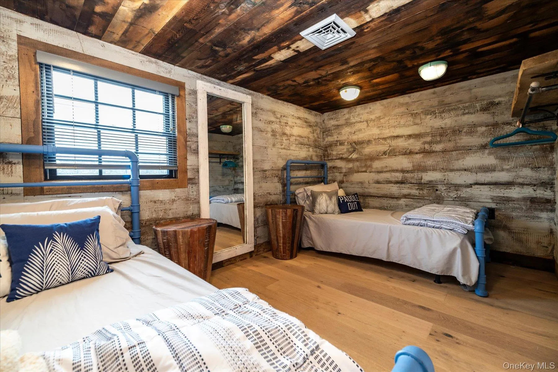 Bedroom with reclaimed wood and flush mount lights Bedroom with reclaimed wood and flush mount lights