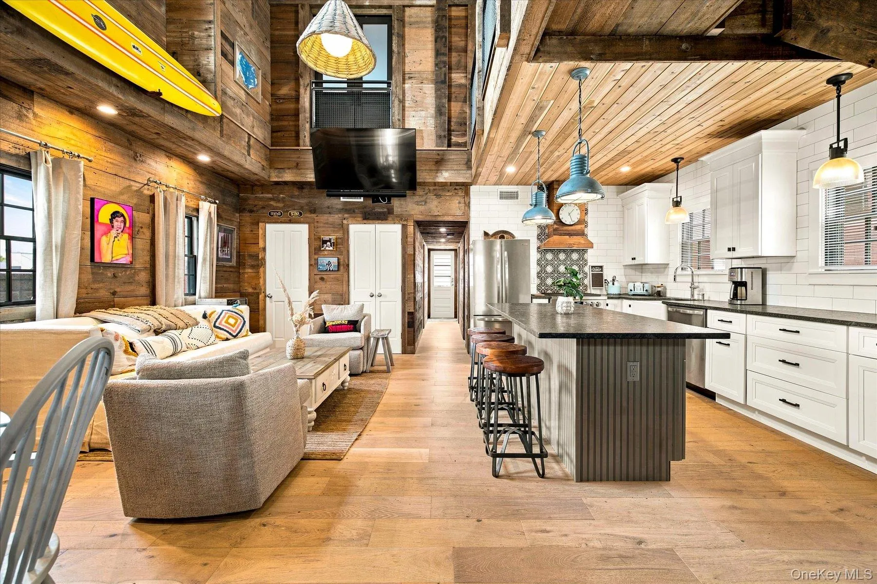 Vaulted wood-paneled ceiling with exposed beams Vaulted wood-paneled ceiling with exposed beams