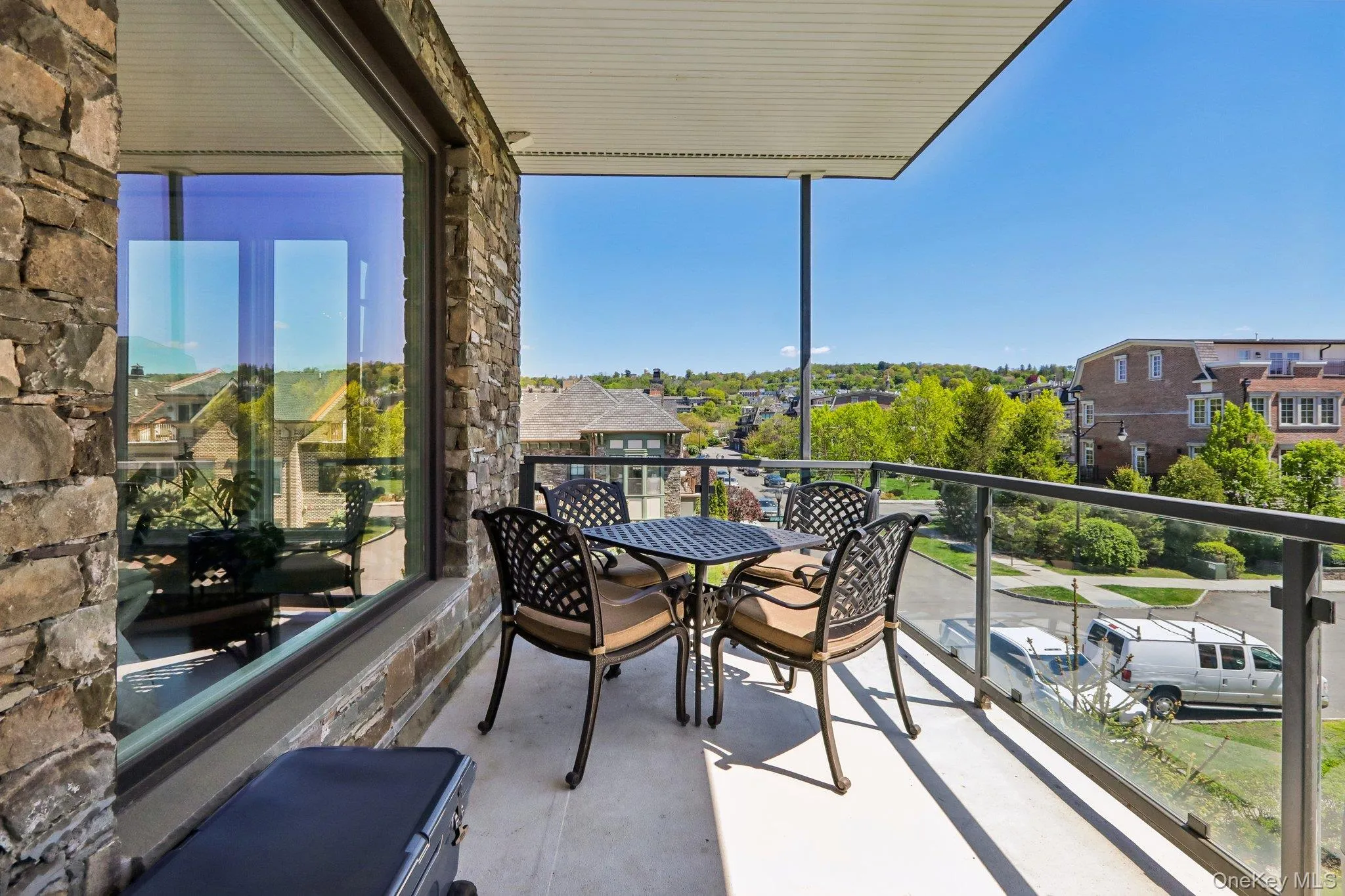 Corner Balcony with view of a private park and the river Corner Balcony with view of a private park and the river