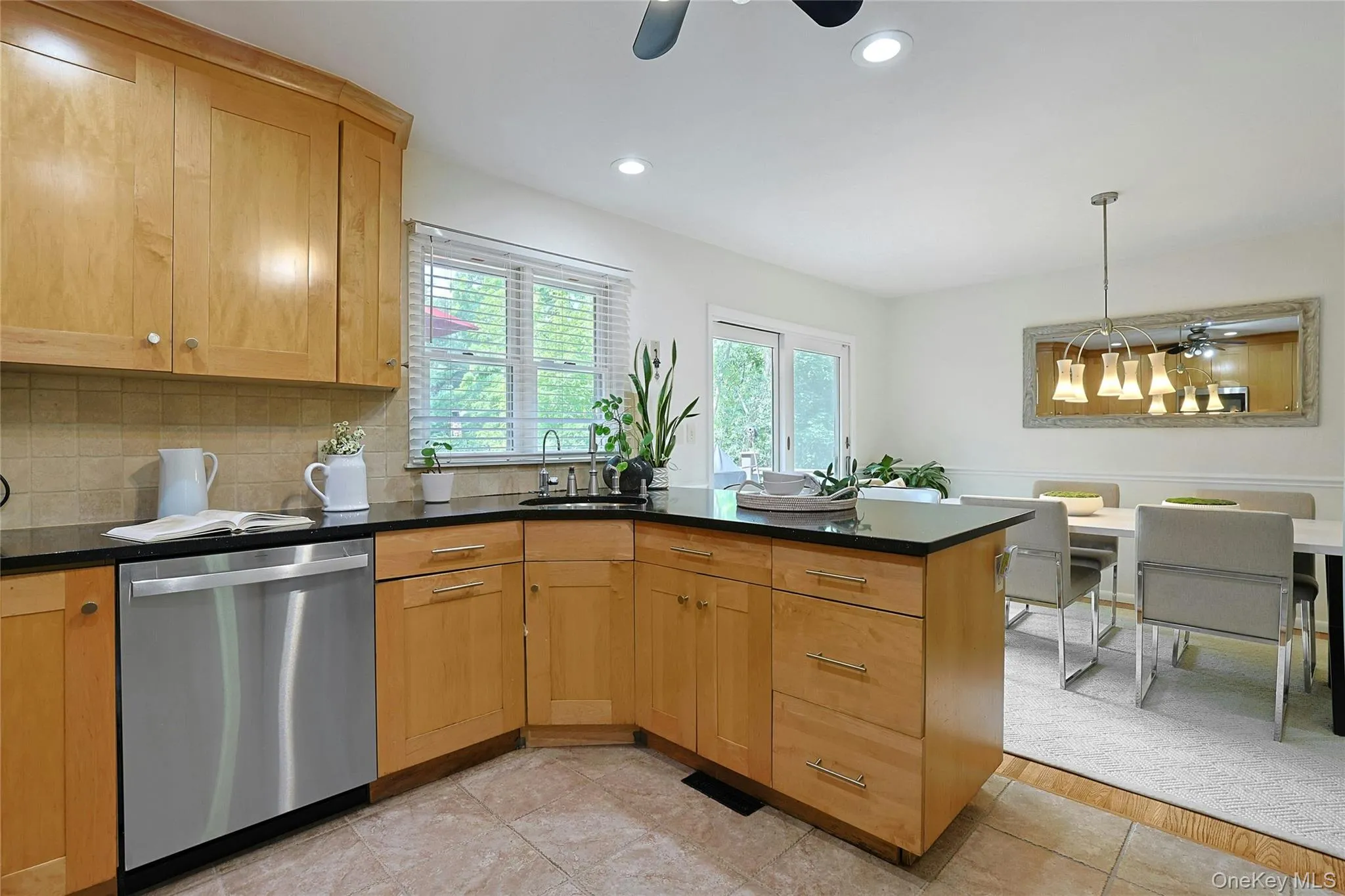 Kitchen open to dining room. Kitchen open to dining room.