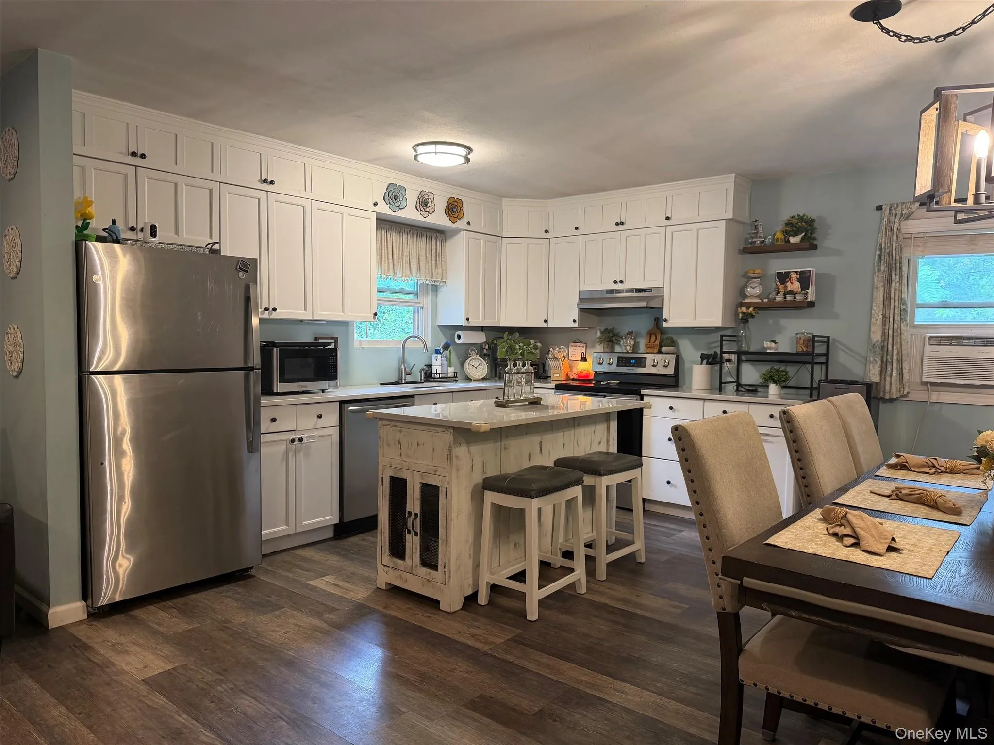 Open concept renovated kitchen with new appliances, quartz countertops, stainless steel appliances Open concept renovated kitchen with new appliances, quartz countertops, stainless steel appliances
