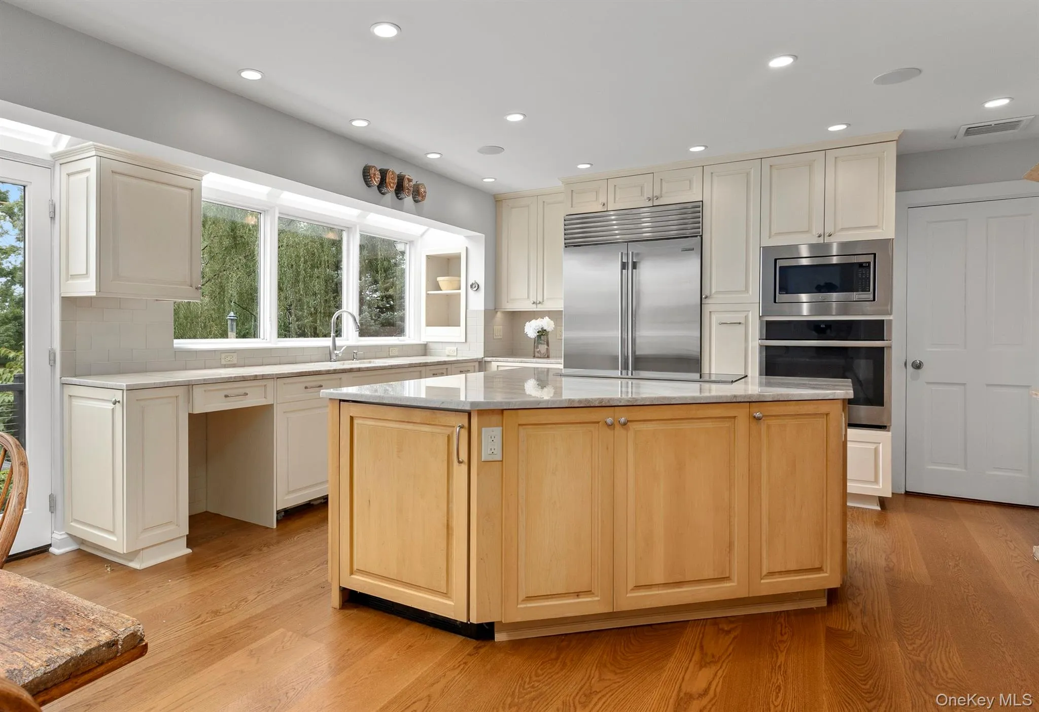 Kitchen with Taj Mahal Countertops Kitchen with Taj Mahal Countertops