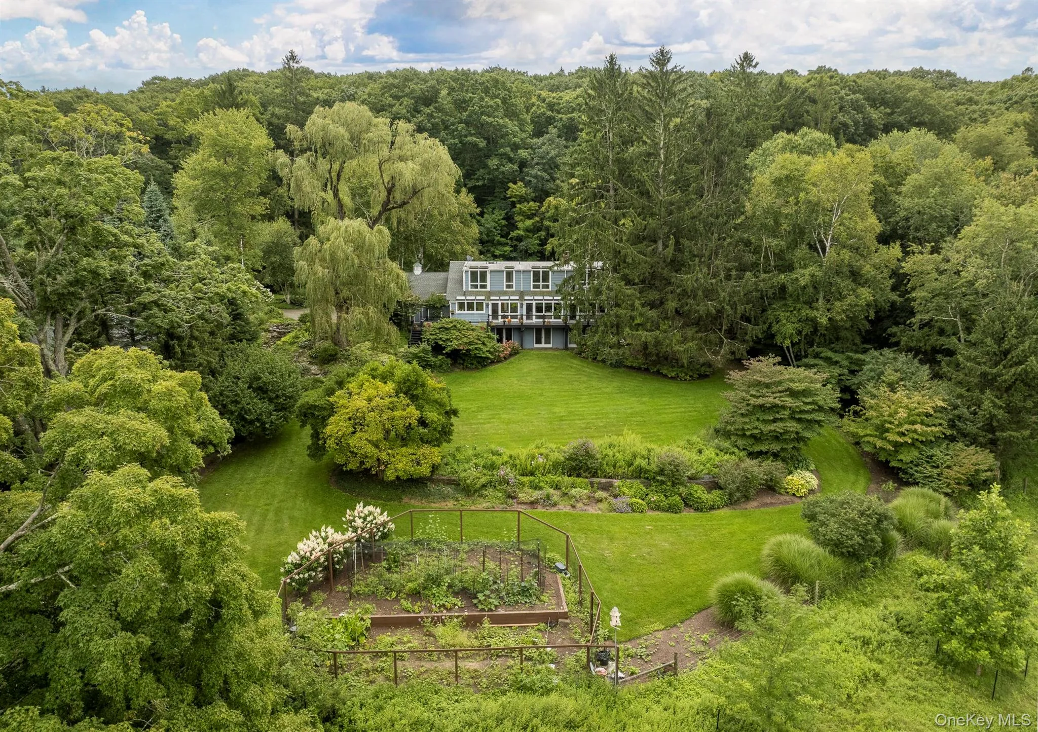 Aerial view of rear lawn and garden Aerial view of rear lawn and garden