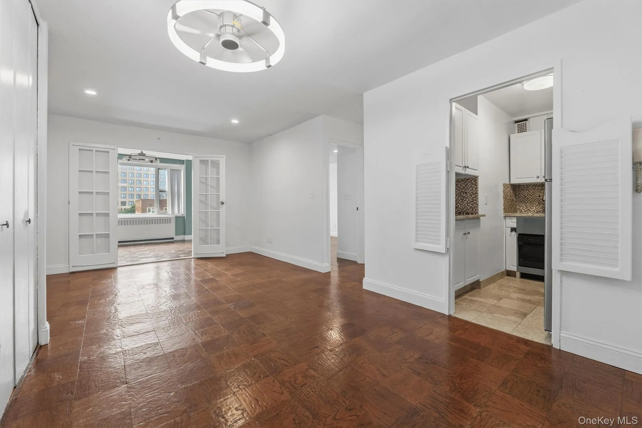 Dining Area/Living Room with view into Kitchen Dining Area/Living Room with view into Kitchen
