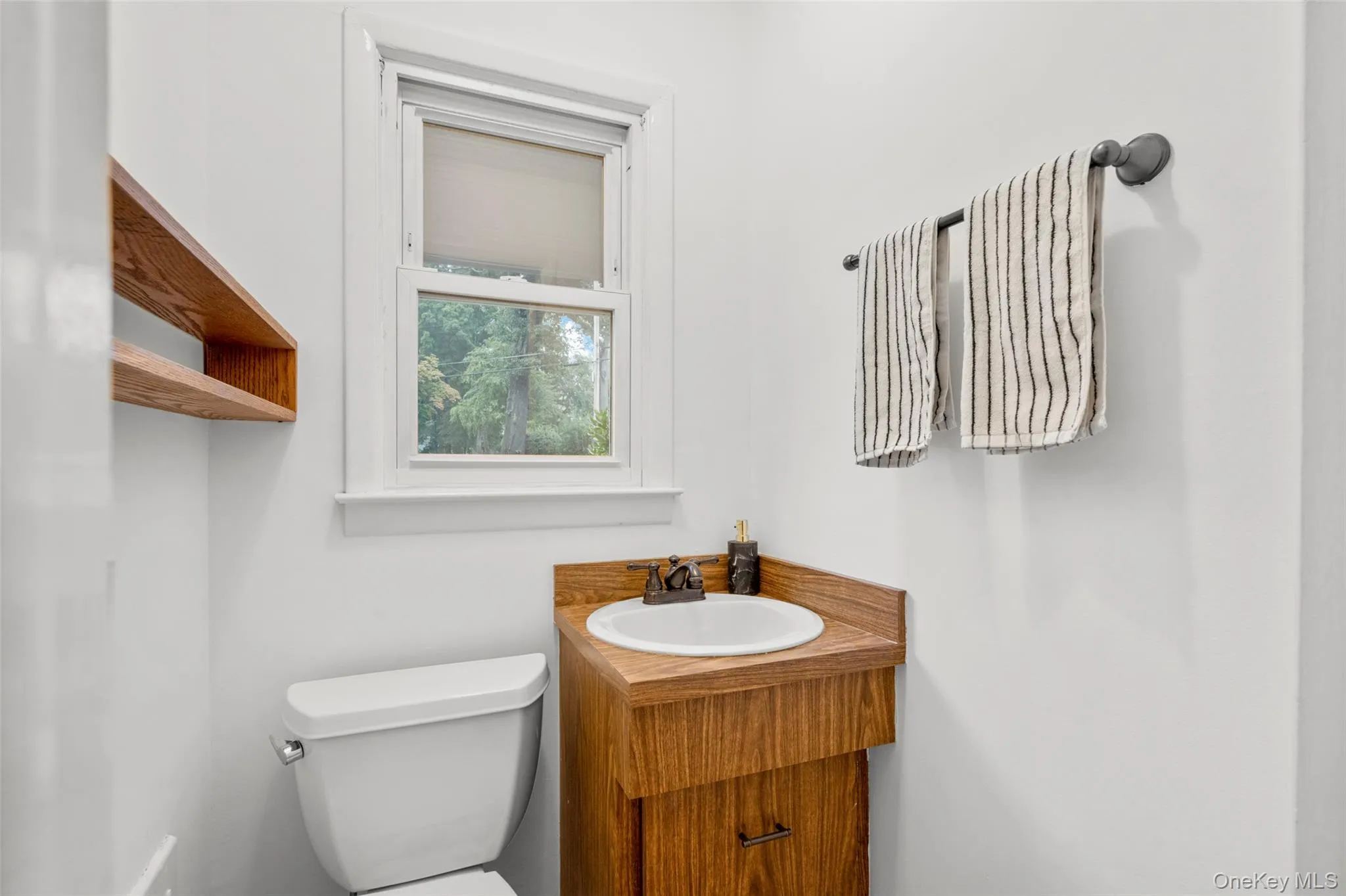 Powder room off of kitchen Powder room off of kitchen