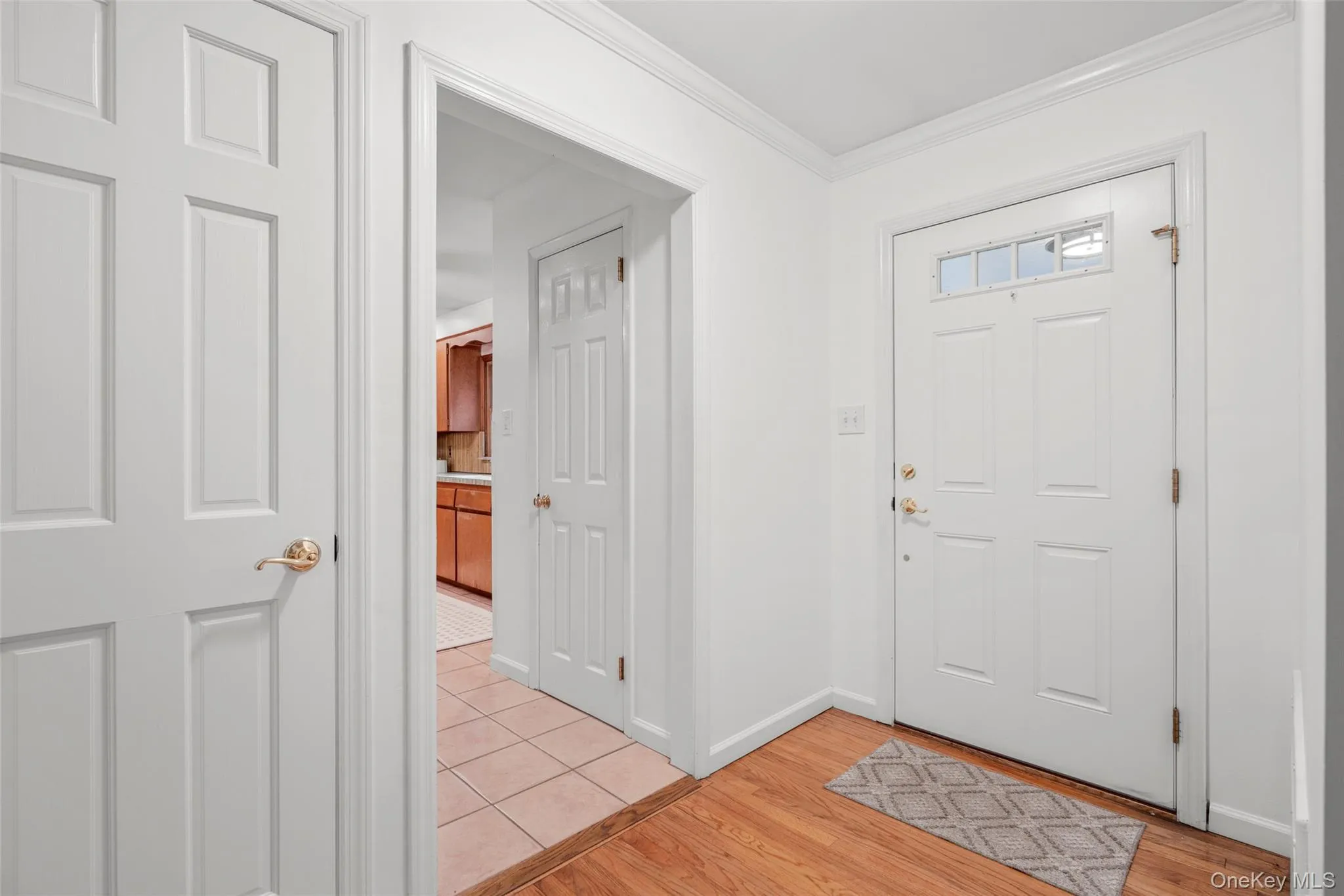 Entry foyer with closet Entry foyer with closet