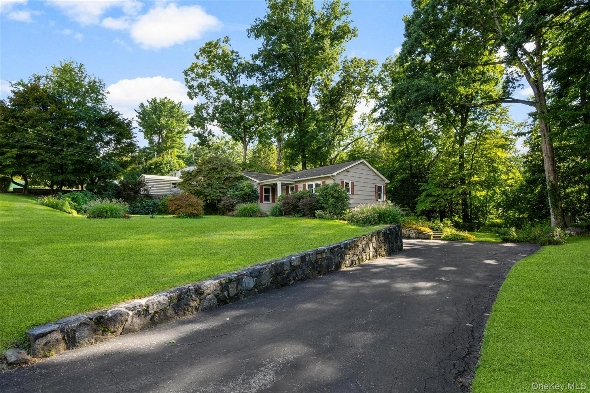 Long driveway to attached garage Long driveway to attached garage