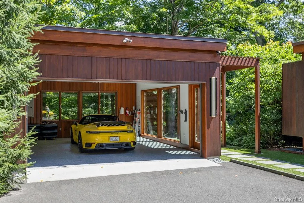 Additional, new detached Climate controlled two car garage with 2 EV electric chargers Additional, new detached Climate controlled two car garage with 2 EV electric chargers