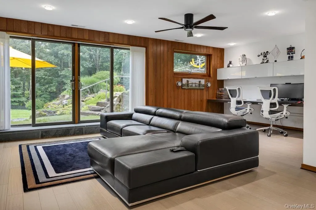 Walk-out lower level- large enough for a media room and office w/floor to ceiling glass doors Walk-out lower level- large enough for a media room and office w/floor to ceiling glass doors