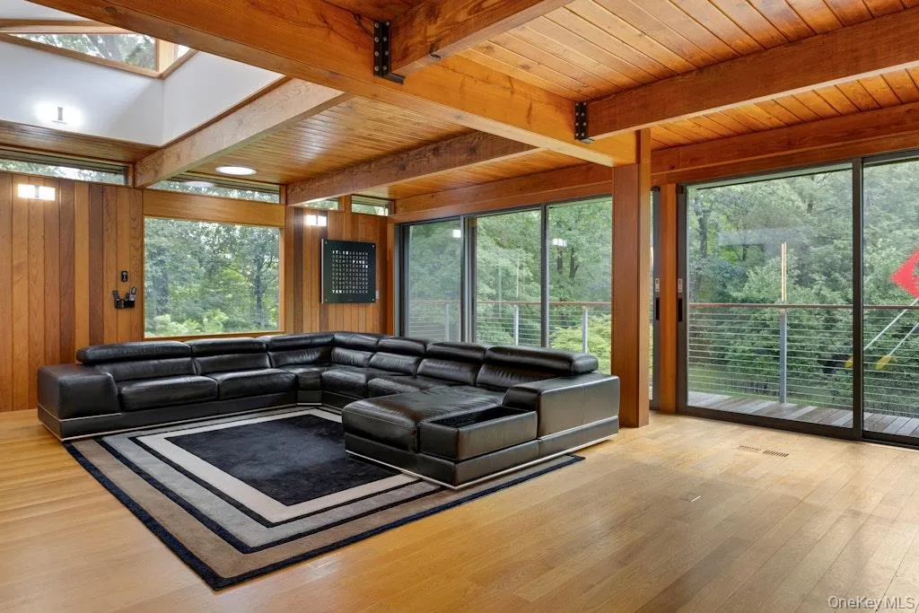 Beamed ceiling and terrace w/electric shades. Room for a dining table as well. Beamed ceiling and terrace w/electric shades. Room for a dining table as well.