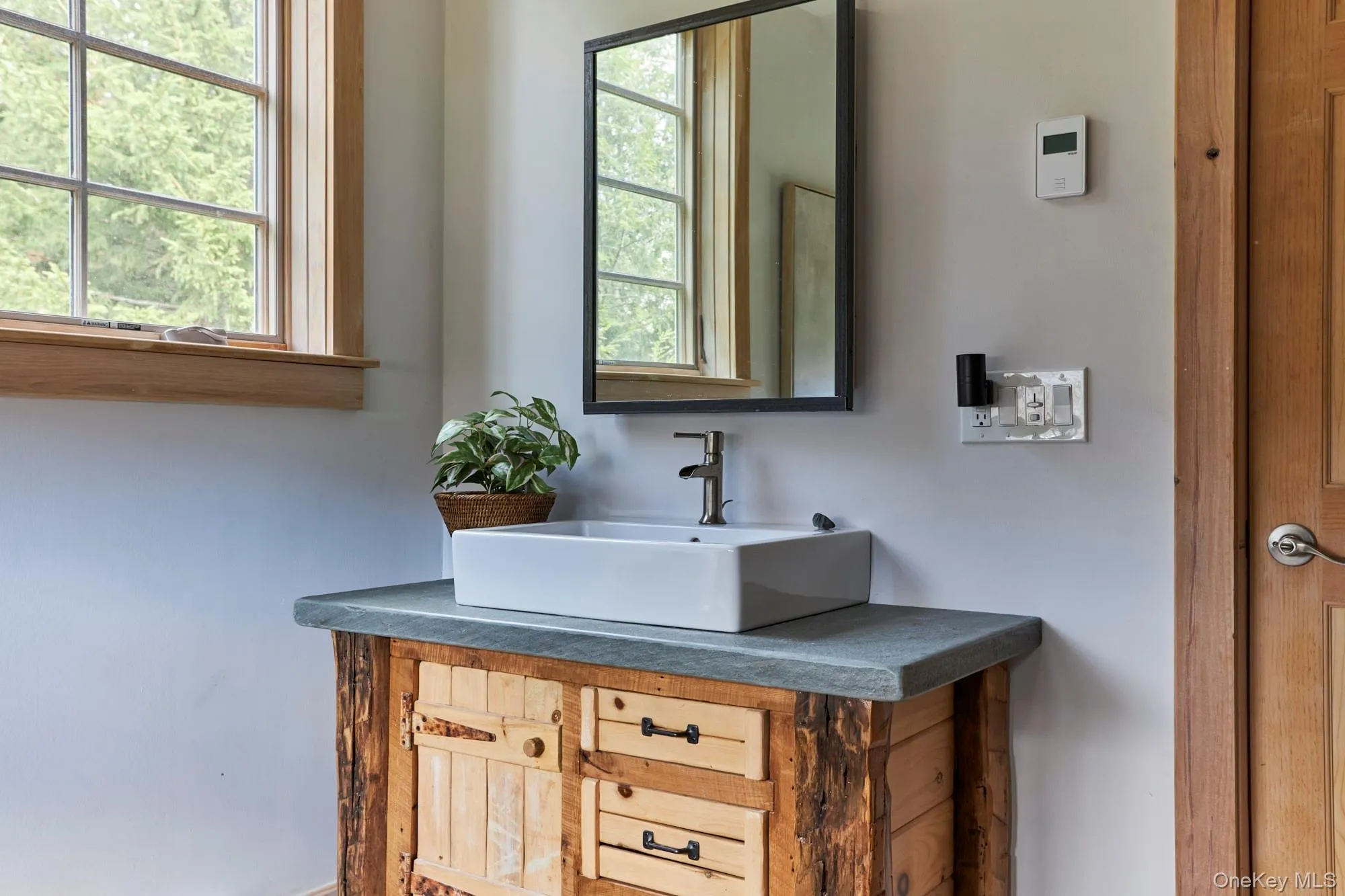 Bathroom featuring vanity Bathroom featuring vanity
