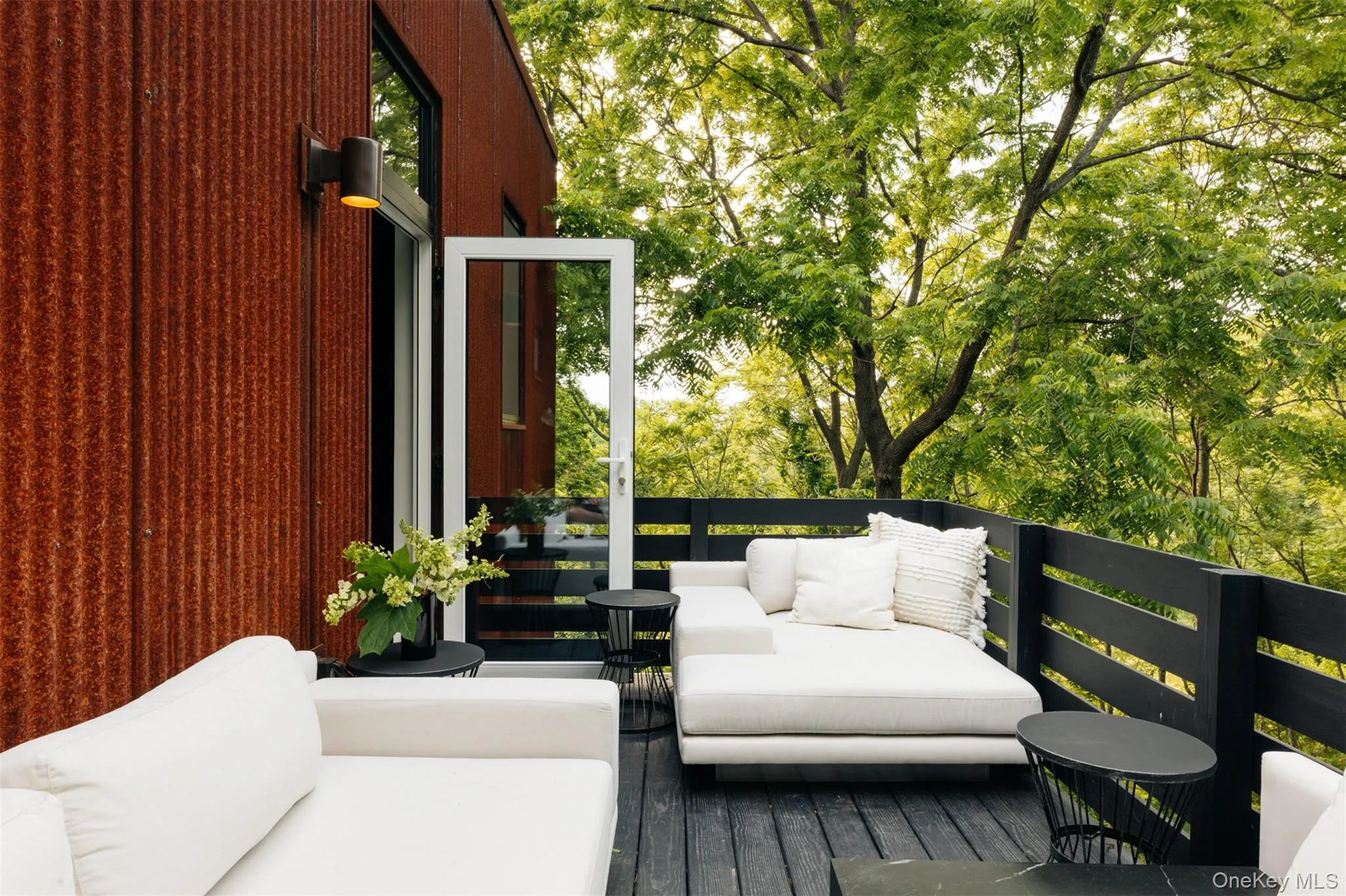 Wooden deck with outdoor lounge area Wooden deck with outdoor lounge area