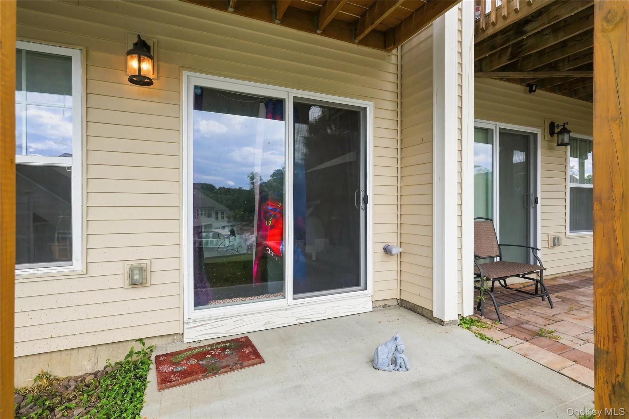 Sliding doors lead to back patio Sliding doors lead to back patio