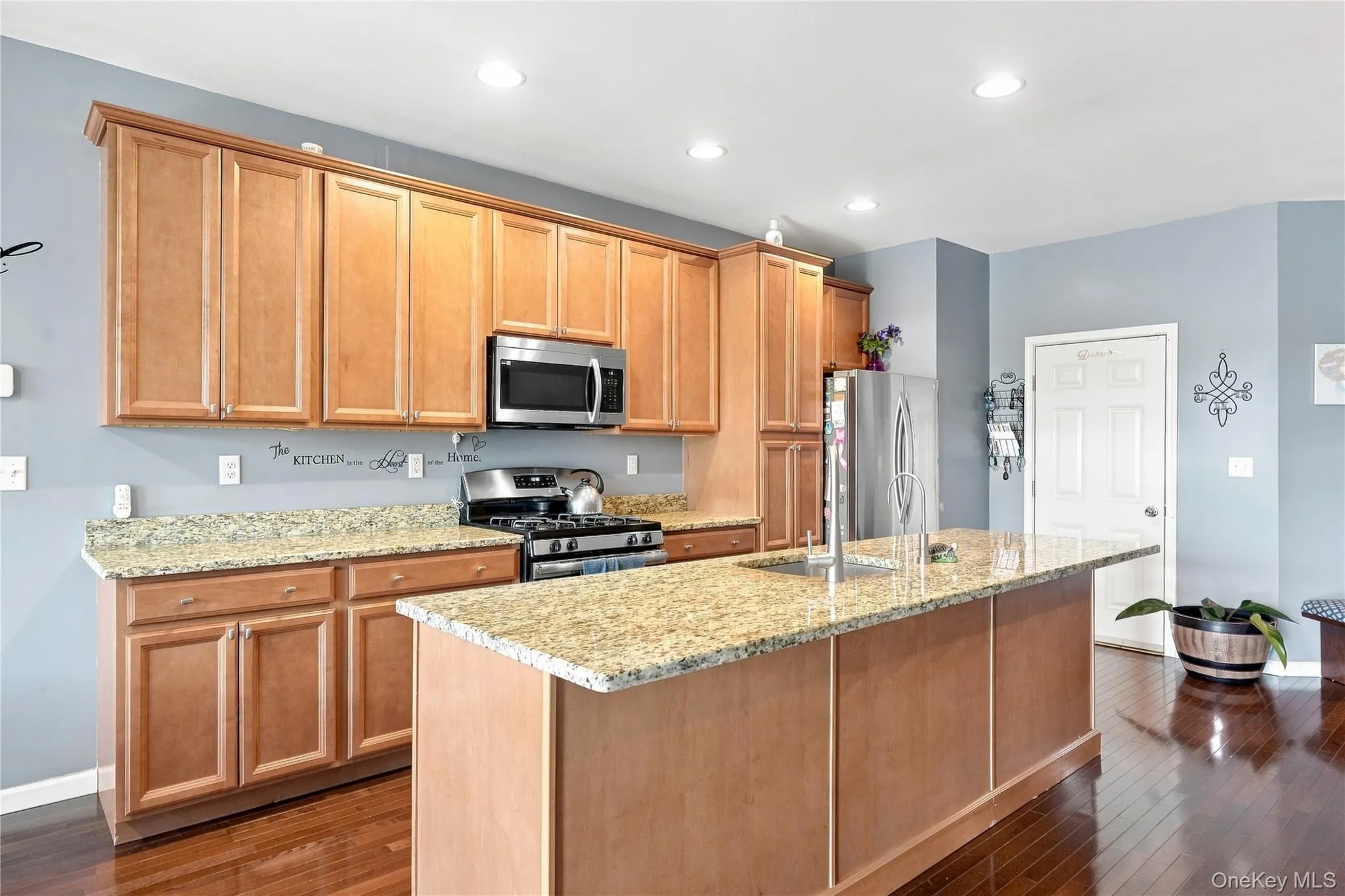 Updated kitchen with granite counters and stainless steel appliances Updated kitchen with granite counters and stainless steel appliances
