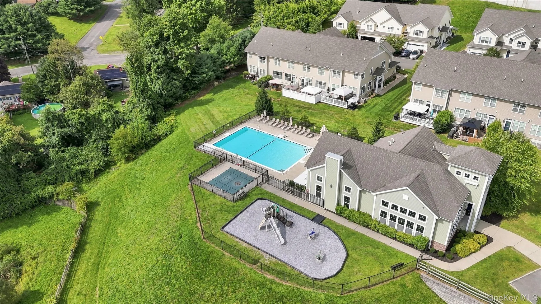 Clubhouse, community pool + playground Clubhouse, community pool + playground