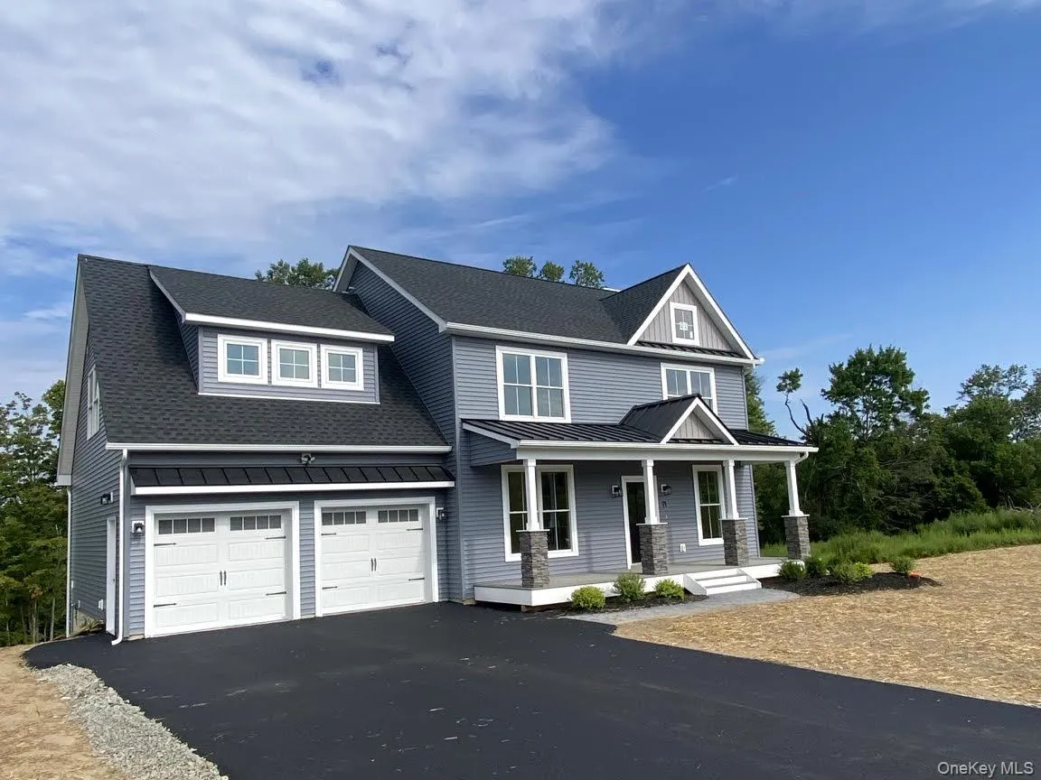 Ready for its new owners, the newly installed driveway is fully complete. Ready for its new owners, the newly installed driveway is fully complete.