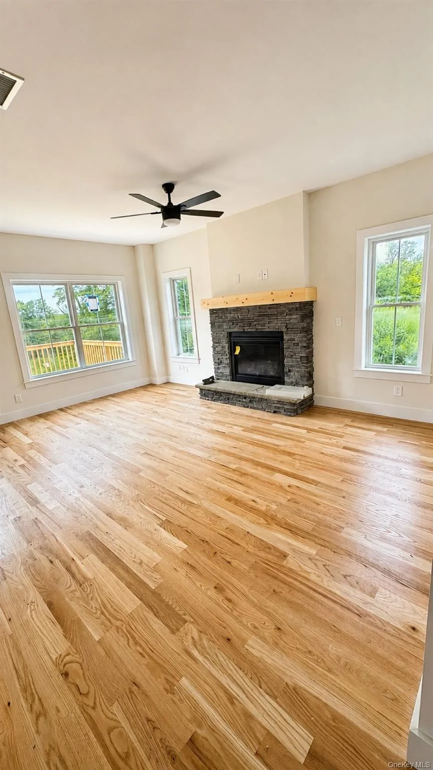 The expansive great room offering an open layout designed for comfortable everyday living and entertaining guests. The expansive great room offering an open layout designed for comfortable everyday living and entertaining guests.