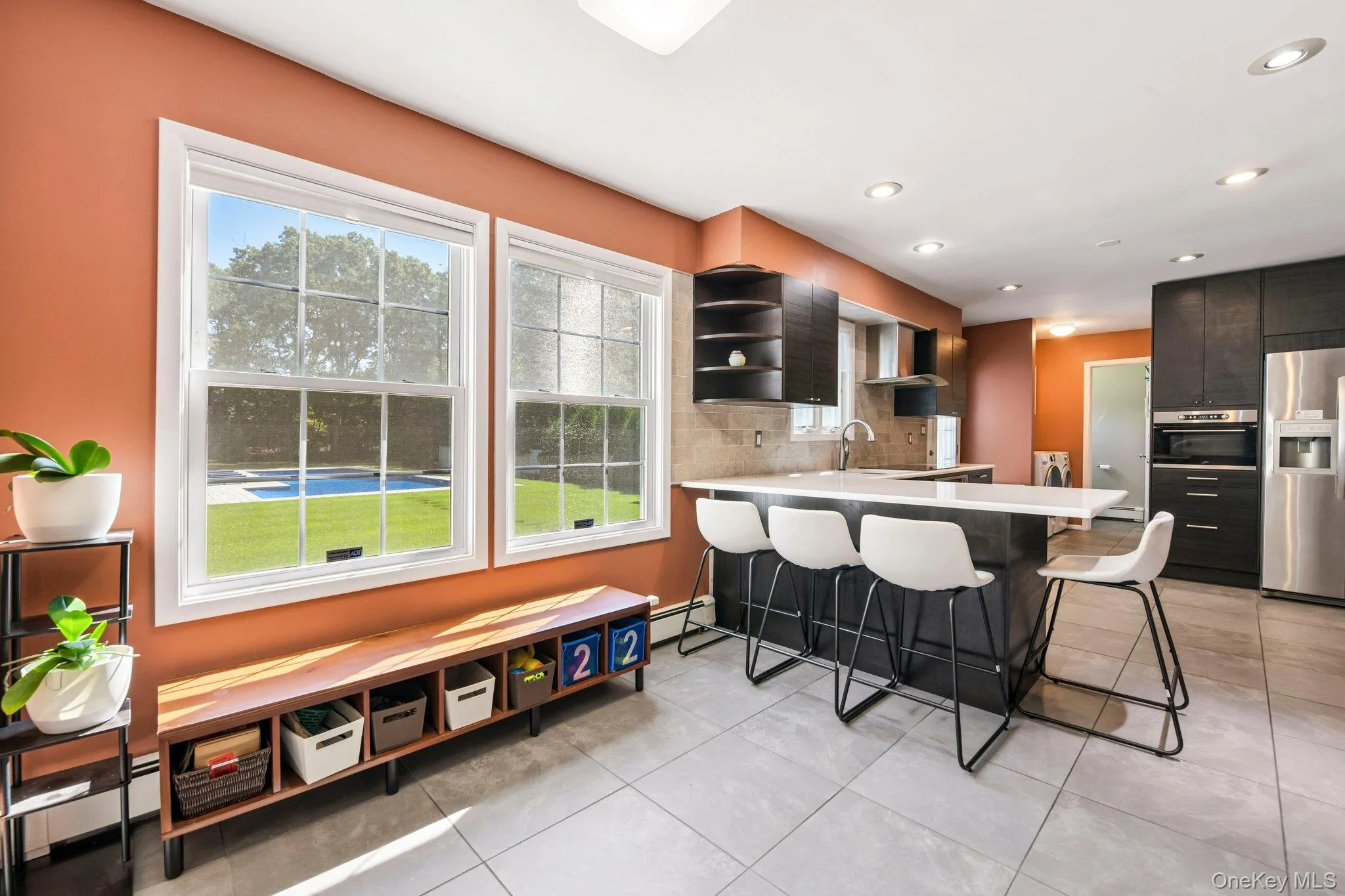 Dining area in kitchen with window view of yard Dining area in kitchen with window view of yard
