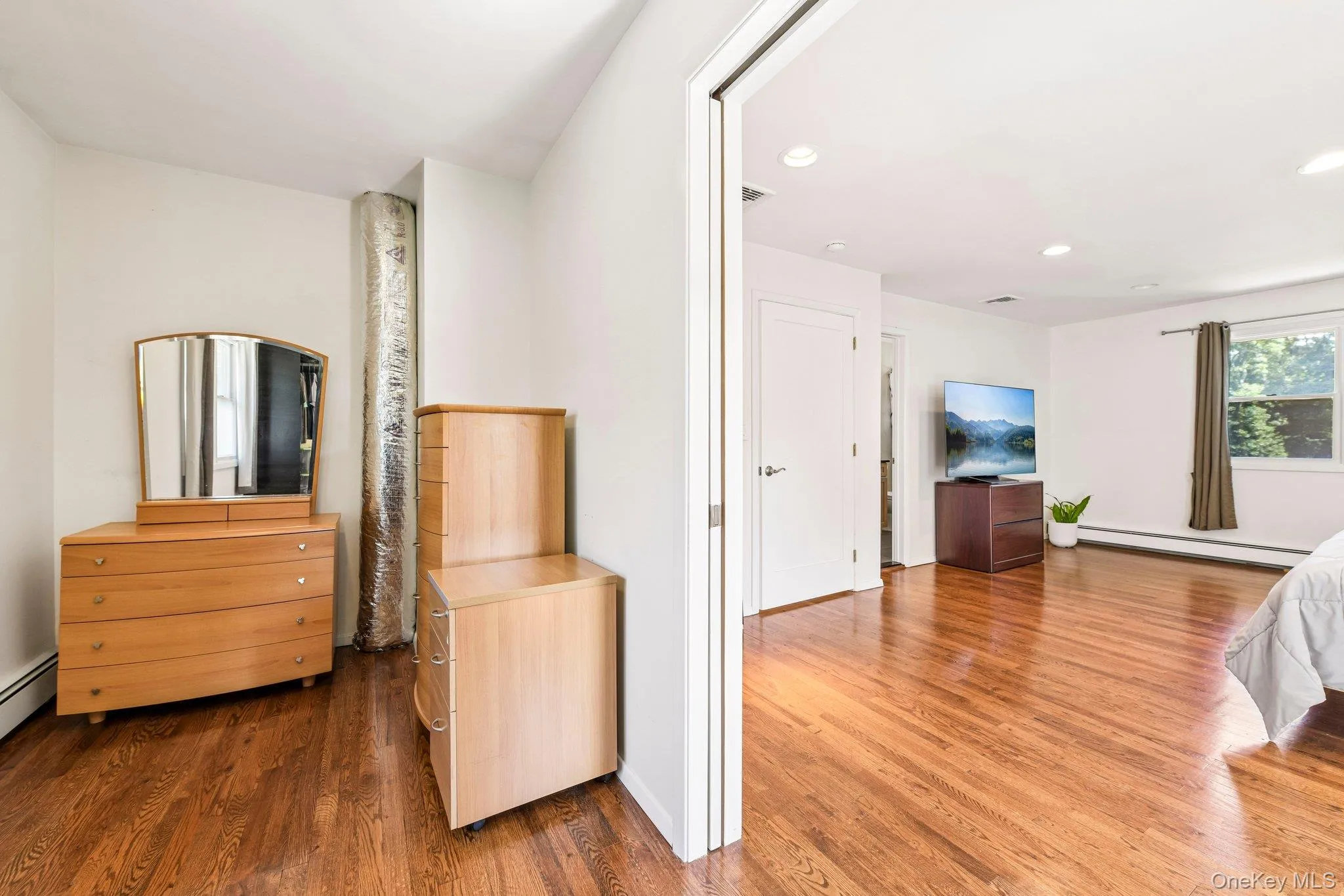 Walk-In Closet with entry to Primary suite. Walk-In Closet with entry to Primary suite.