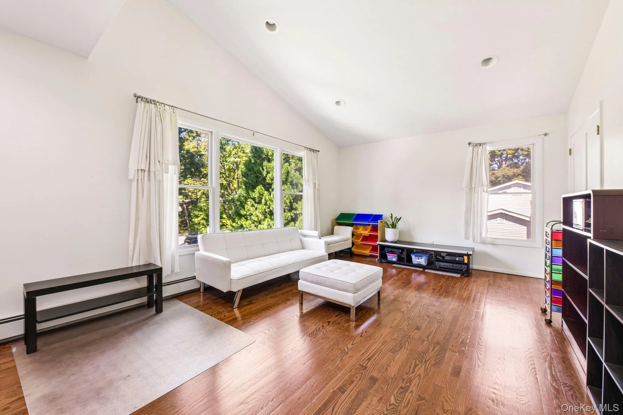 Bedroom #3, Large room with cathedral ceiling, Hi-hats, wood floor, double closet, plenty of window & light Bedroom #3, Large room with cathedral ceiling, Hi-hats, wood floor, double closet, plenty of window & light