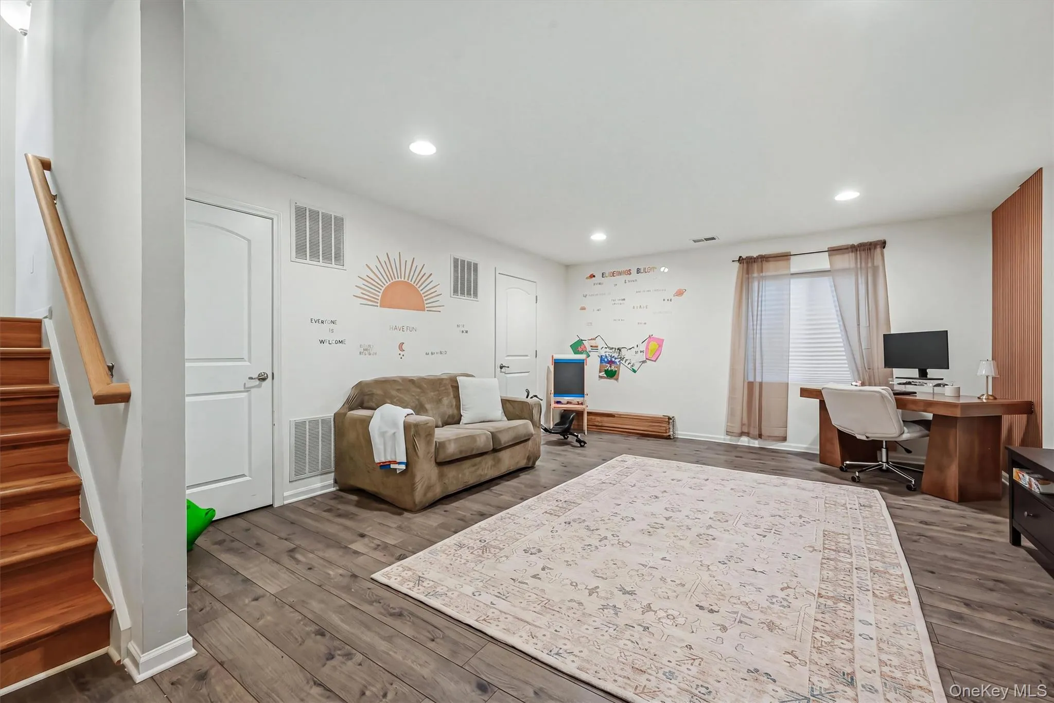 Spacious Finished Basement with Laundry Room Access Spacious Finished Basement with Laundry Room Access