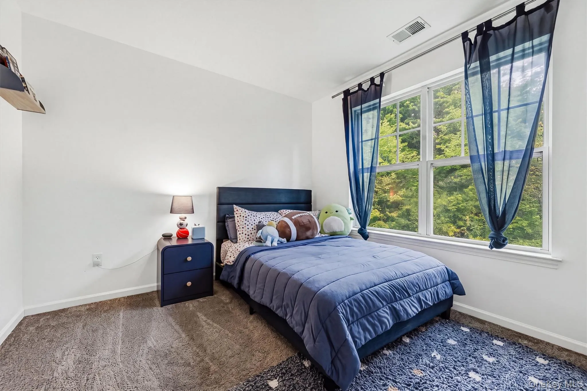 Third Bedroom with large window Third Bedroom with large window