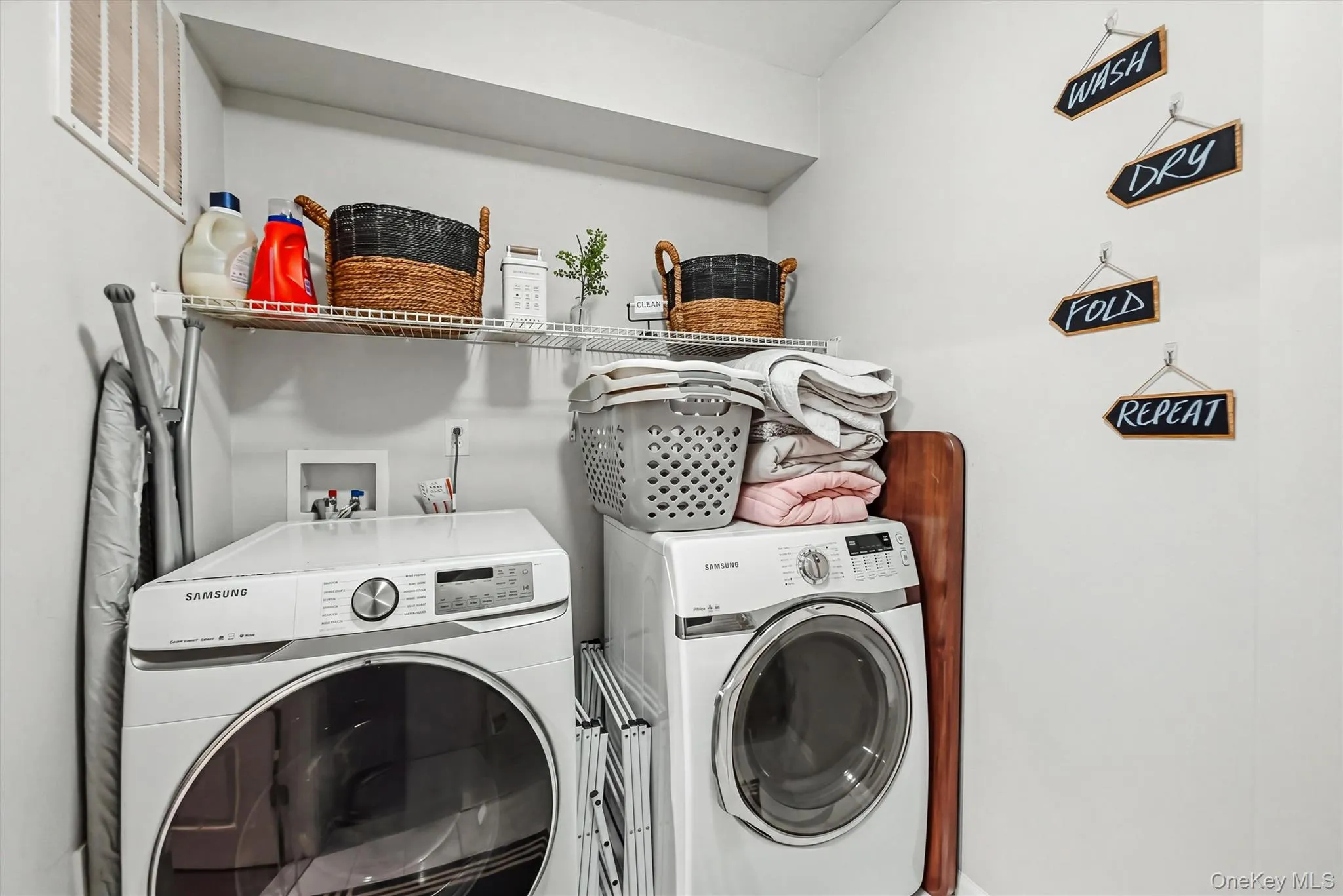 Spacious Laundry Room with shelving Spacious Laundry Room with shelving