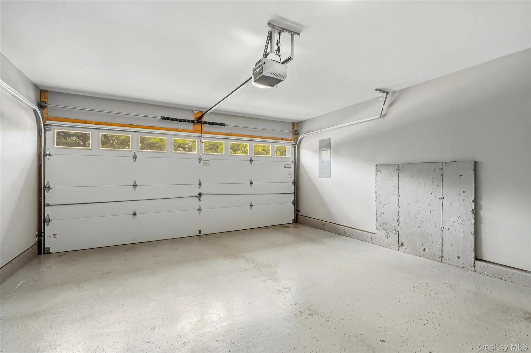 Expansive 2 Car Garage leading to Basement for secondary access Expansive 2 Car Garage leading to Basement for secondary access