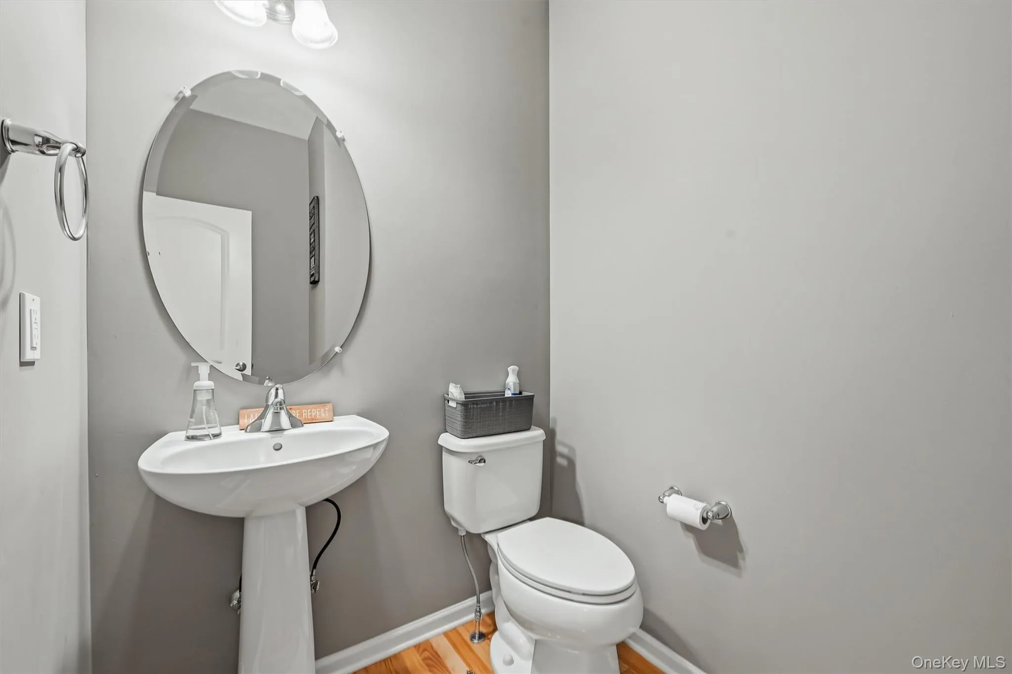 Hallway Half Bathroom on Main Level Hallway Half Bathroom on Main Level