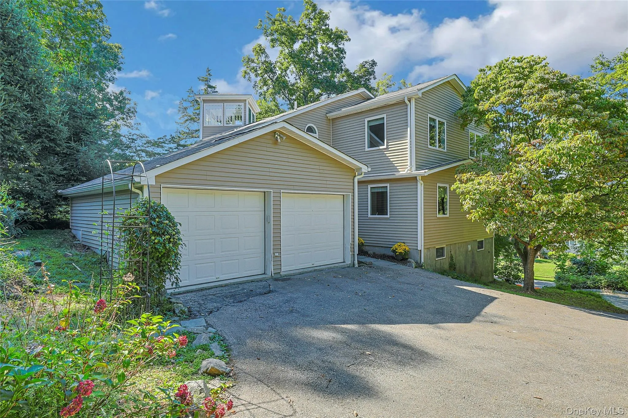 Spacious two-car garage provides convenient covered parking and easy everyday access to the home. Spacious two-car garage provides convenient covered parking and easy everyday access to the home.