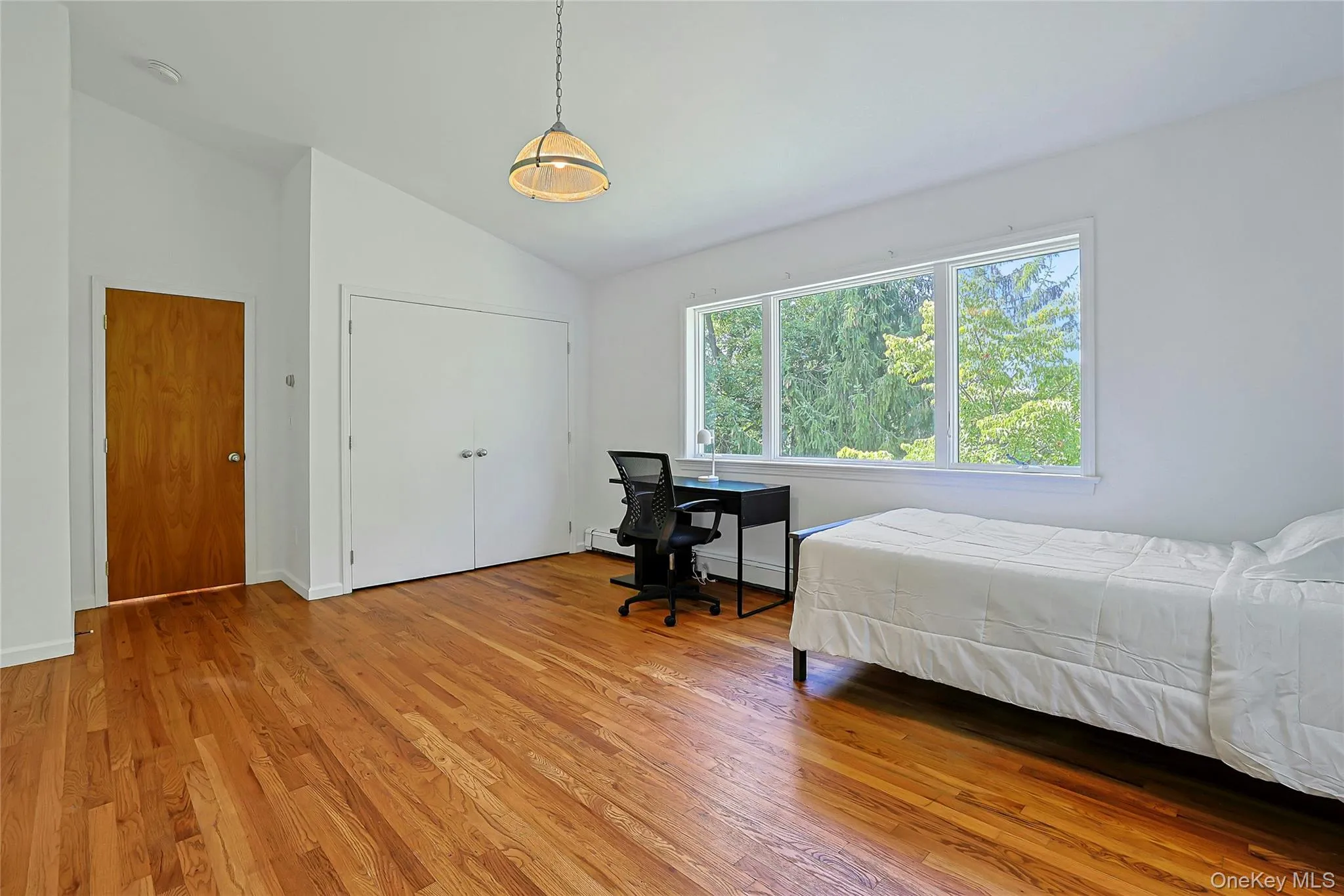 Second bedroom with a closet offers a comfortable, versatile space for family or guests Second bedroom with a closet offers a comfortable, versatile space for family or guests