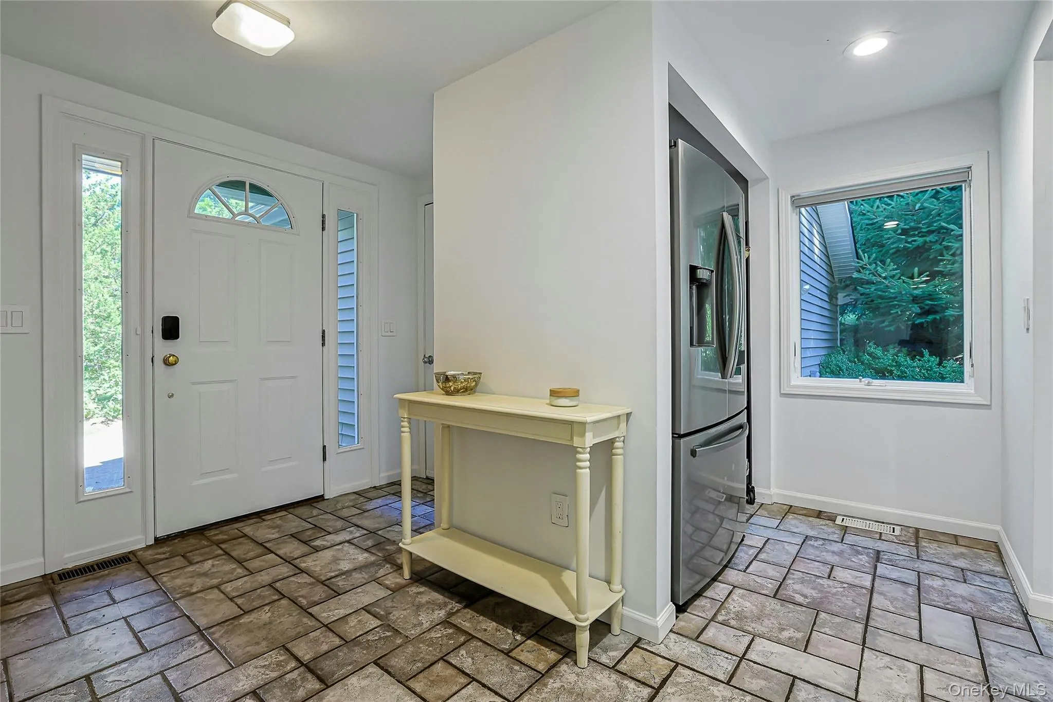 Entry offers convenient access to the kitchen, creating an easy and functional flow as you enter the home. Entry offers convenient access to the kitchen, creating an easy and functional flow as you enter the home.