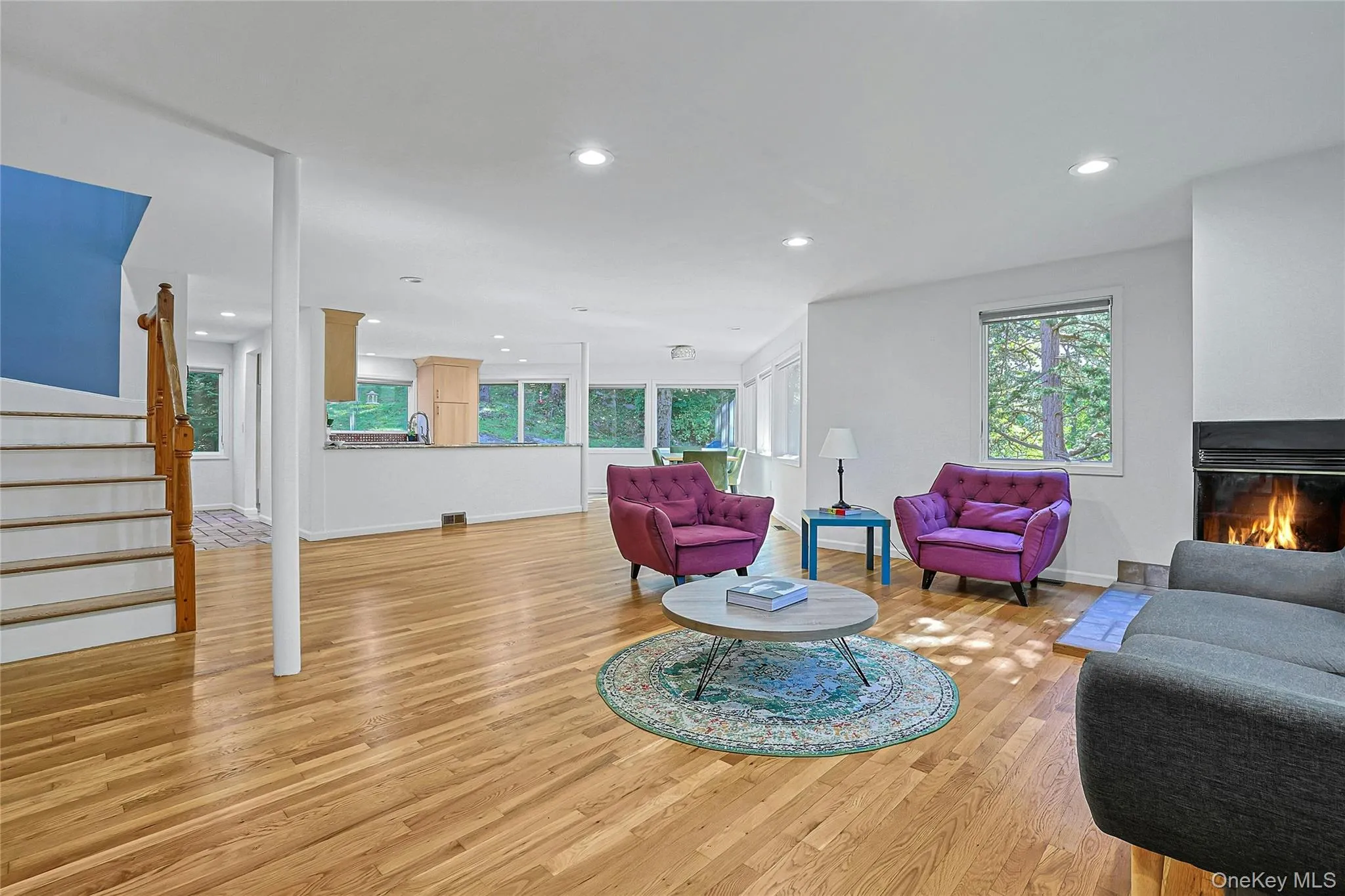 Spacious open living room flows seamlessly into the dining room and kitchen, creating an easy layout for everyday living and entertaining. Spacious open living room flows seamlessly into the dining room and kitchen, creating an easy layout for everyday living and entertaining.