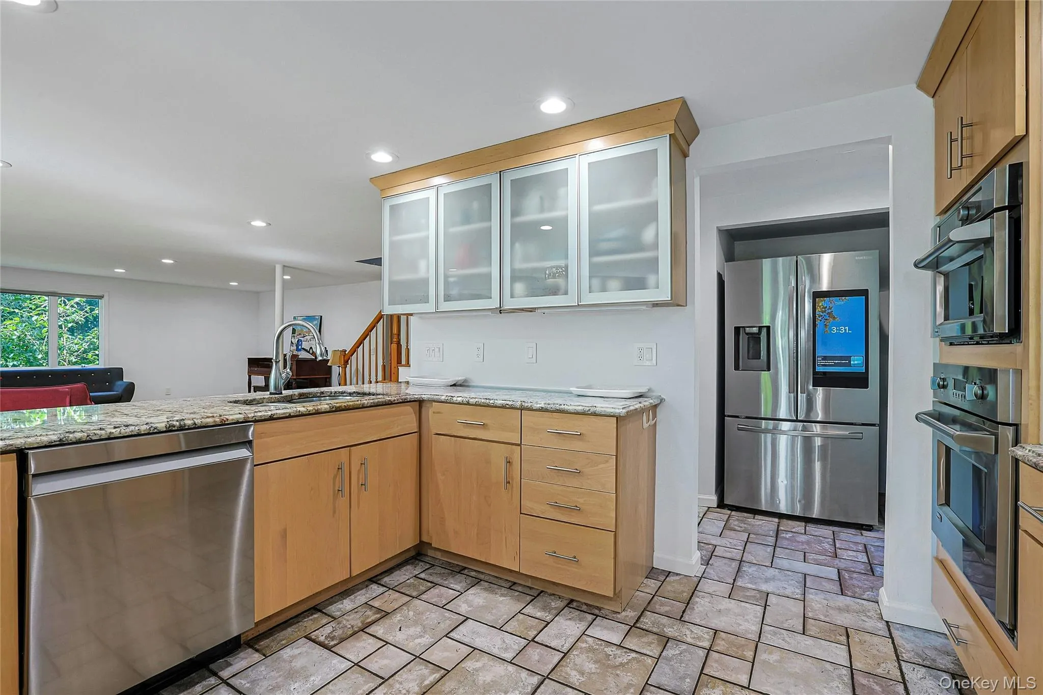 Conveniently placed refrigerator is just steps from the main prep and cooking areas, keeping everything within easy reach. Conveniently placed refrigerator is just steps from the main prep and cooking areas, keeping everything within easy reach.