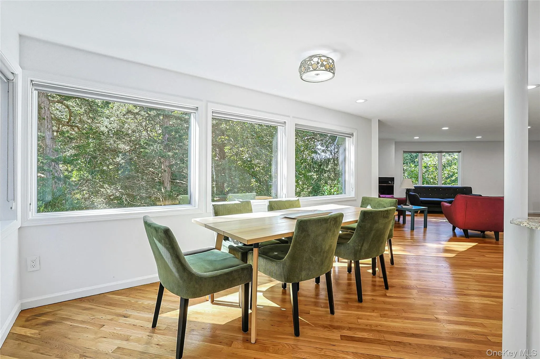 Window-lined dining room Leads to living room and offers a beautiful setting for everything from casual meals to memorable gatherings with family and friends. Window-lined dining room Leads to living room and offers a beautiful setting for everything from casual meals to memorable gatherings with family and friends.