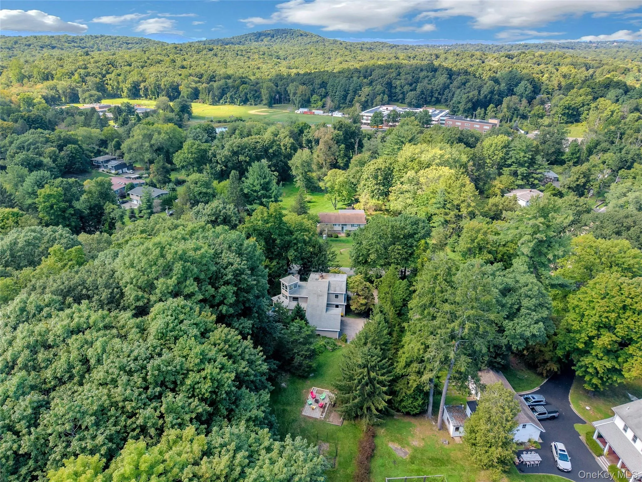 Aerial view showcases the home surrounded by vast countryside, highlighting the peaceful setting, open landscape, and sense of privacy. Aerial view showcases the home surrounded by vast countryside, highlighting the peaceful setting, open landscape, and sense of privacy.
