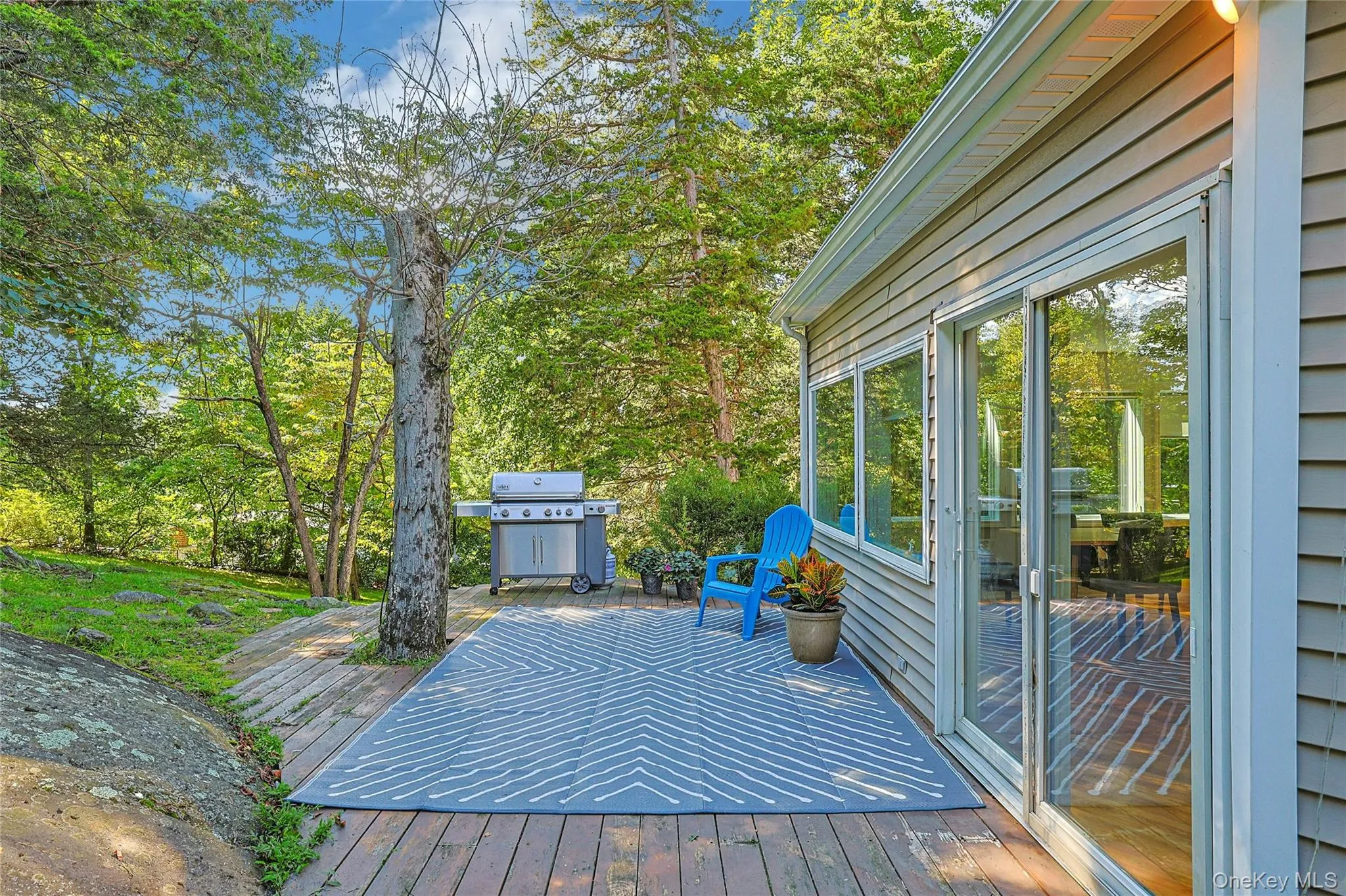 Spacious deck offers room for a BBQ, outdoor dining table, and chairs—perfect for casual meals and entertaining outdoors. Spacious deck offers room for a BBQ, outdoor dining table, and chairs—perfect for casual meals and entertaining outdoors.
