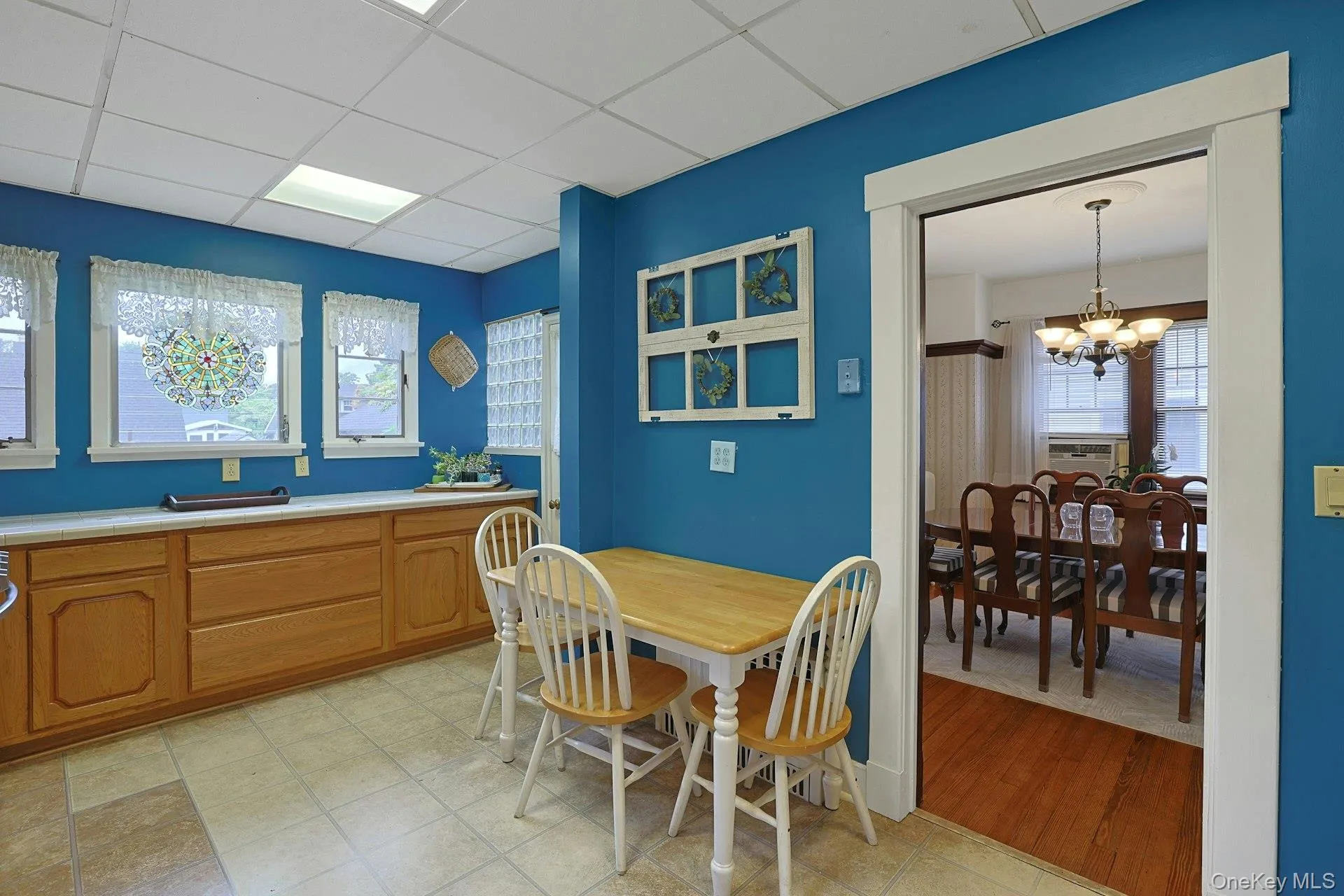 Eat-in-kitchen offers plenty of counter space for meal prep and everyday use, with large windows bringing in abundant natural light. Eat-in-kitchen offers plenty of counter space for meal prep and everyday use, with large windows bringing in abundant natural light.