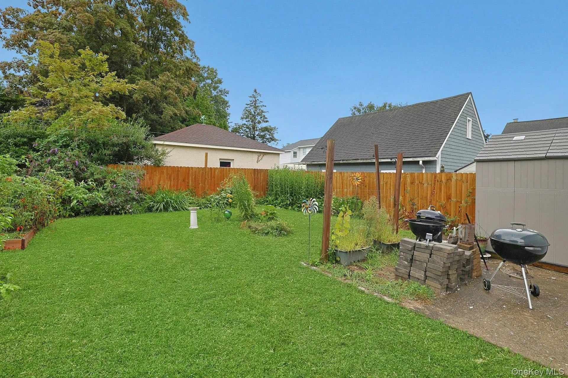 Plenty of backyard space for badminton, lawn games, outdoor gatherings, or simply relaxing and enjoying the outdoors. Plenty of backyard space for badminton, lawn games, outdoor gatherings, or simply relaxing and enjoying the outdoors.